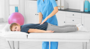 Physiotherapist working with patient in clinic